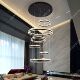 Large hollow staggered chandelier in the duplex building of the villa