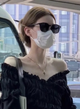 开车骑行小框小脸墨镜女