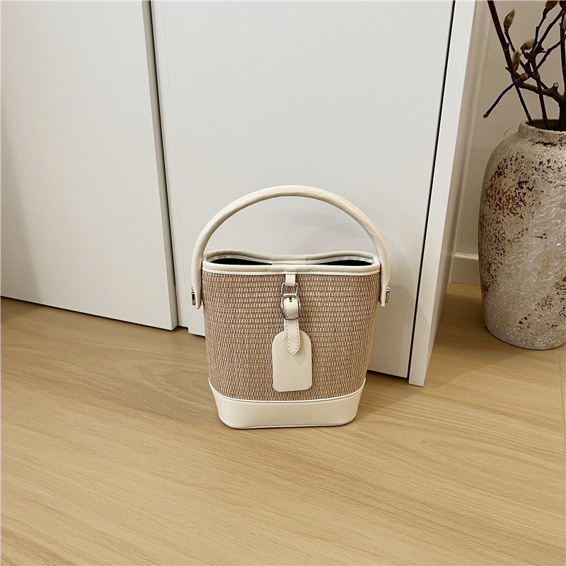 小脏柜 高级感小众设计夏季草编包复古拼接水桶包手提单肩斜挎包,淘宝优惠券,粉丝福利购,淘宝优惠卷