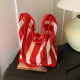 This year's popular bags for women 2025 new fashion striped hollow shoulder bag large capacity vacation tote bag
