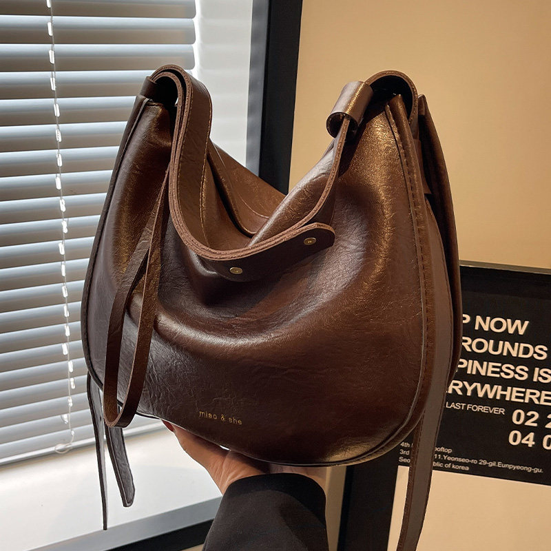 大容量包包女2025新款流行高级感复古美拉德单肩包通勤斜挎水桶包,淘宝优惠券,粉丝福利购,淘宝优惠卷