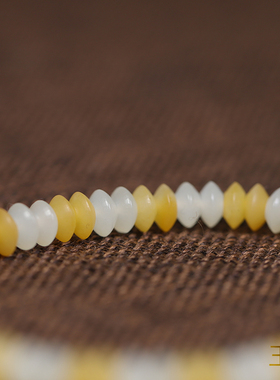 玉奕和田玉籽料白玉黄沁飞碟手串