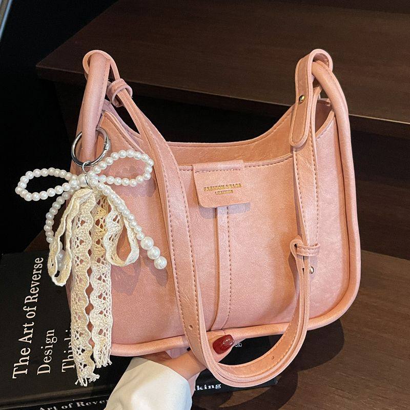 小众设计包包女2025春夏新款韩版大容量单肩腋下包百搭斜挎水桶包,淘宝优惠券,粉丝福利购,淘宝优惠卷