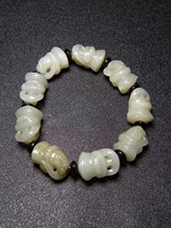 Mindai and Tian Qing Baiyu Jade Round Sculpted Human with a string of hand strings