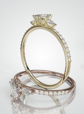 18K金水滴主石伴钻戒臂三石戒指