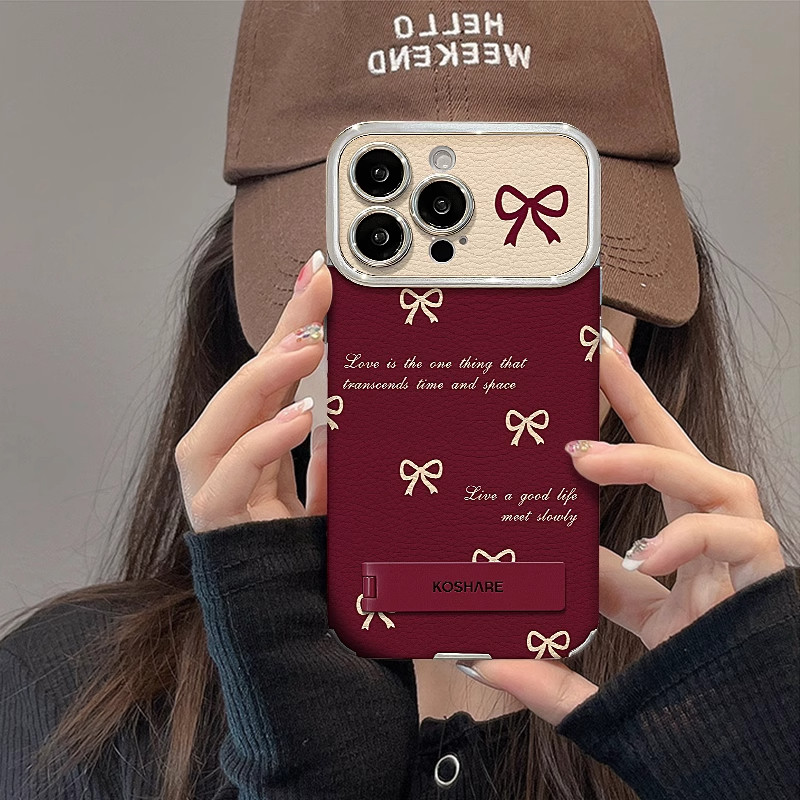 2025新年女款蝴蝶结适用苹果16pro安可拉红手机壳红色15promax支架Phone14plus大视窗羊皮13高级感11电镀12套