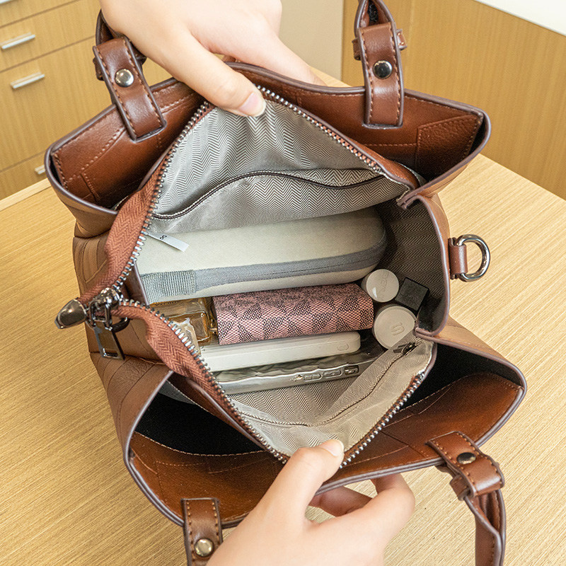 香港代购真皮包包女2025新款潮手提包大容量水桶包复古单肩斜挎包,淘宝优惠券,粉丝福利购,淘宝优惠卷