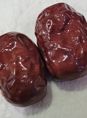 阜新十家子纯天然玛瑙手工雕刻手把件大枣早日发财收藏臻品健手石