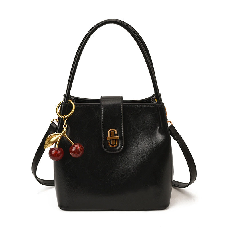 手拎上班通勤包包女式2025新款秋冬轻奢小众高级感复古斜挎水桶包,淘宝优惠券,粉丝福利购,淘宝优惠卷