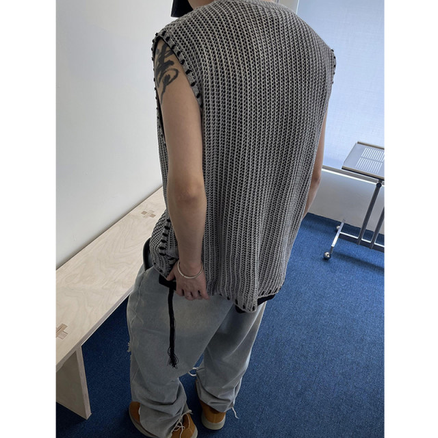 Reflective yarn threaded fringed hollow knitted vest