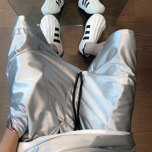 Black and silver glossy draped sports shorts five-point pants