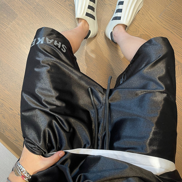 Black and silver glossy draped sports shorts five-point pants