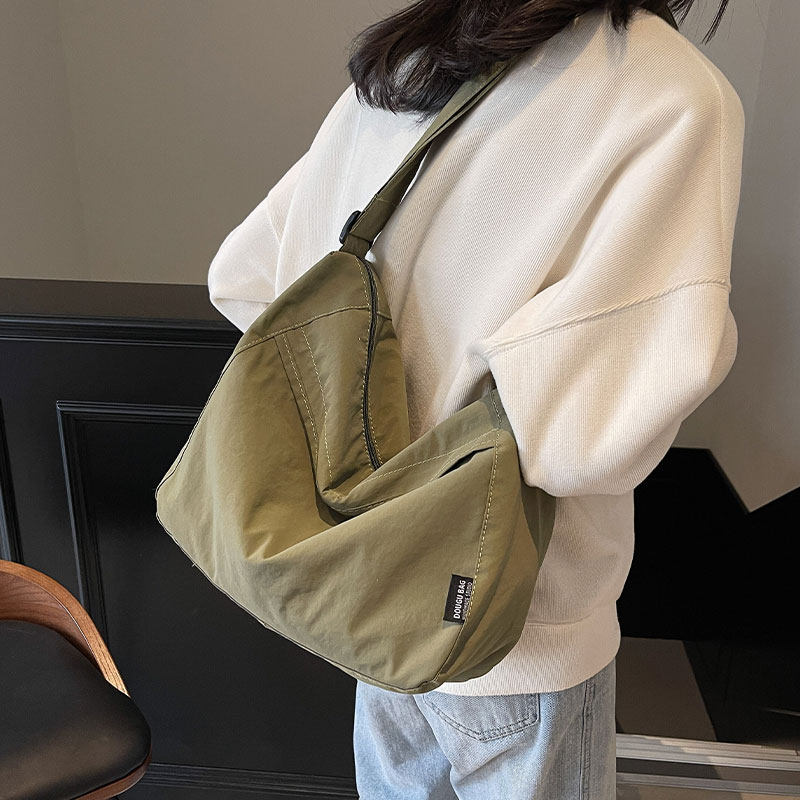 简约日系纯色尼龙帆布包包女2025新款休闲斜挎包大容量单肩通勤包,淘宝优惠券,粉丝福利购,淘宝优惠卷