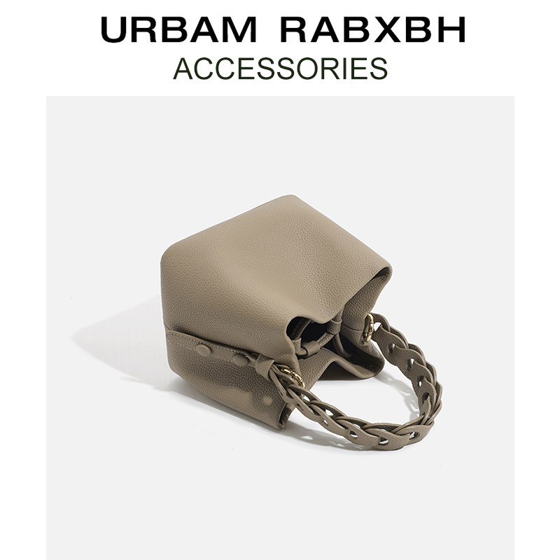 原创设计真皮手提小包包2025春季新款小众编织水桶包高级感斜挎包,淘宝优惠券,粉丝福利购,淘宝优惠卷