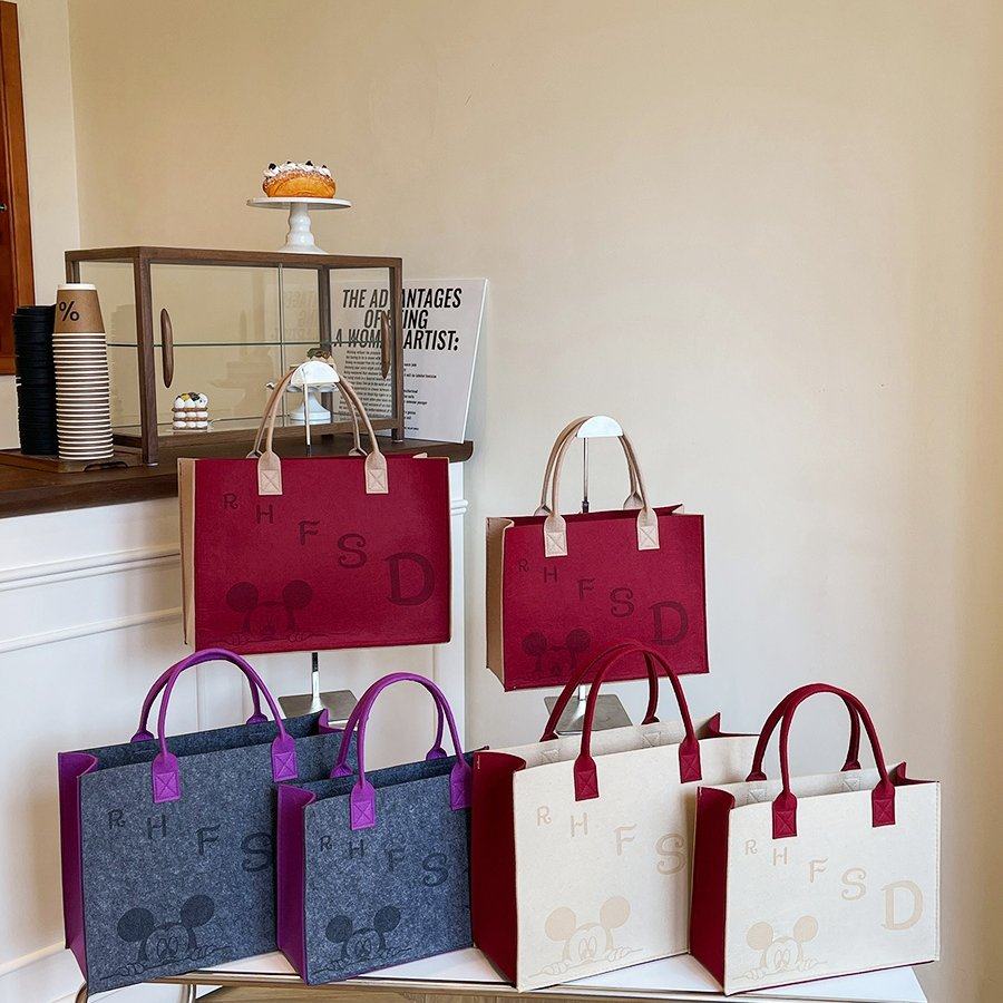 新款毛毡包手提袋定制印刷logo卡通字母手提袋大容量包包购物袋女,淘宝优惠券,粉丝福利购,淘宝优惠卷