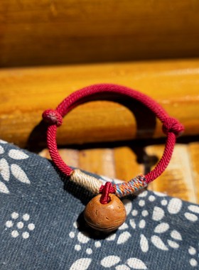 手工雕刻编制桃木压惊红绳手链