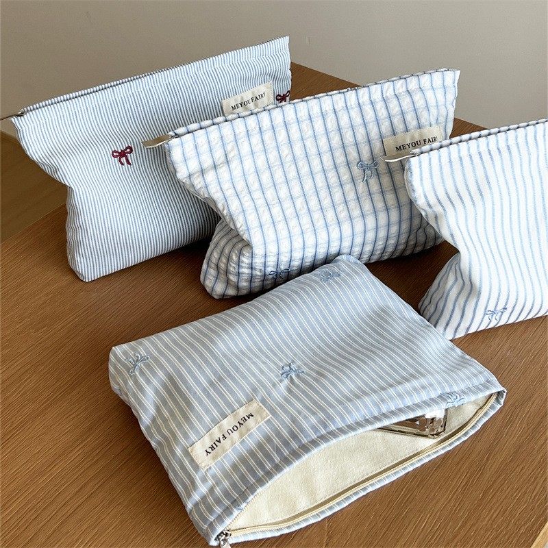 ins小众简约条纹化妆包甜美蝴蝶结收纳袋钱包小方包内胆包笔袋,淘宝优惠券,粉丝福利购,淘宝优惠卷