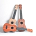 Đàn guitar nhỏ của trẻ em có thể chơi nhạc cụ mô phỏng đàn gỗ 21 inch ukulele bốn dây đàn piano và đàn ông đồ chơi trẻ em - Đồ chơi âm nhạc / nhạc cụ Chirldren