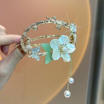 ໂລຫະປະສົມເຫຼັກ imitation pearl hair accessories flower tassel butterfly blooming twist clip temperament hair twister one-word clip