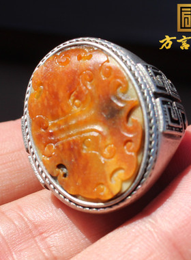 新疆黄沁皮和田籽料兽面银镶玉