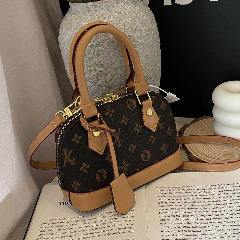 网红小众包包女士2025新款潮手提时尚质感贝壳包百搭斜挎单肩小包,淘宝优惠券,粉丝福利购,淘宝优惠卷