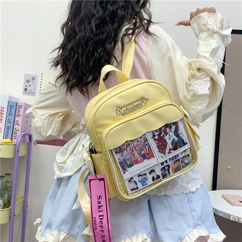 原创设计可爱双肩包蝴蝶结大容量痛包简约通勤包学生书包 - 图2