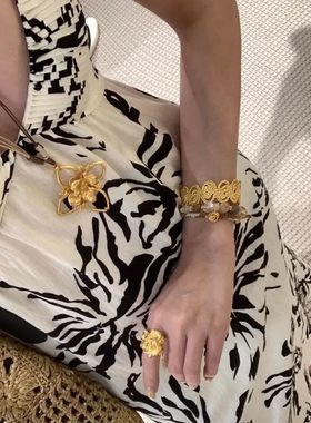 夏日新款枝影编绳项链ins金属镂空花朵手工编绳毛衣链