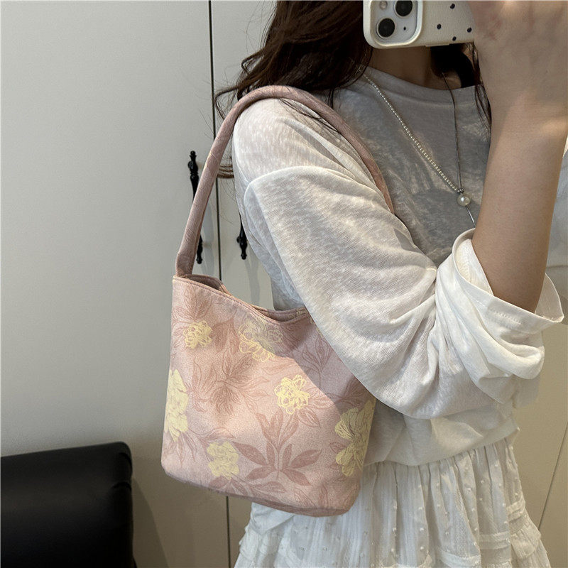 新中式国风包包女式2025新款流行时尚超火单肩包大容量通勤水桶包,淘宝优惠券,粉丝福利购,淘宝优惠卷