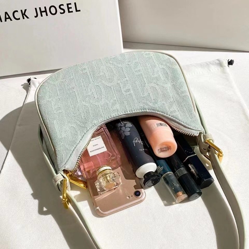 包包女2025新款牛仔布小众设计月牙腋下包高级感马鞍包新月手提包,淘宝优惠券,粉丝福利购,淘宝优惠卷