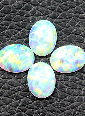 斑彩白欧泊石透亮合成光面澳宝