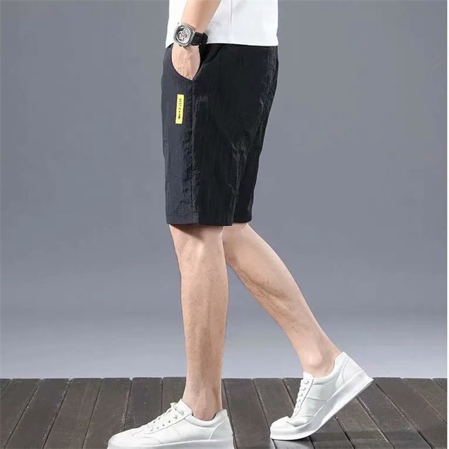 Clear warehouse picking up one get one free one -free ice pants male loose summer five -point leisure short pants thin beach sports pants