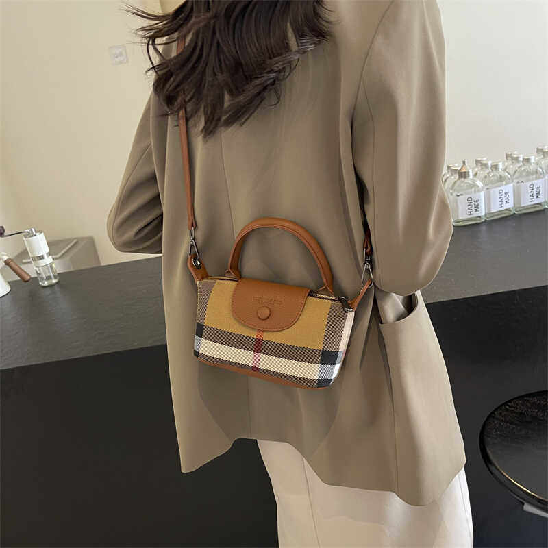 欧美时尚真皮女包潮2025新款休闲百搭手提迷你饺子包单肩斜挎小包,淘宝优惠券,粉丝福利购,淘宝优惠卷