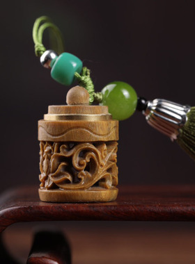 绿檀木刻镂空桶型香囊手
