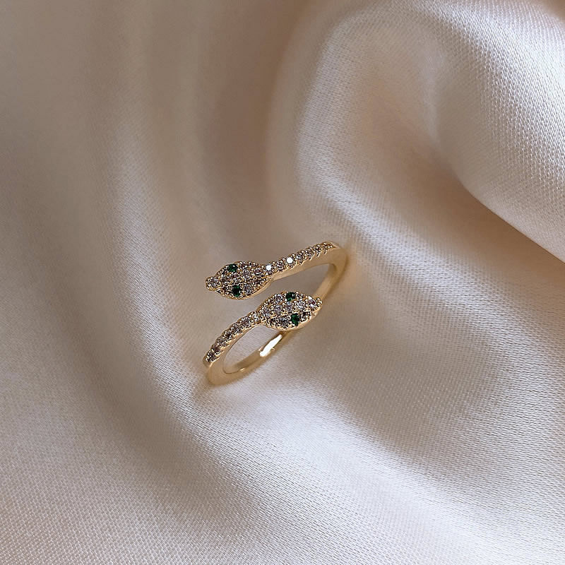 Korean style double-headed snake-shaped open ring with diamonds