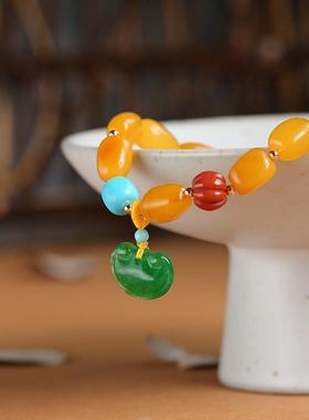 厂家直销天然蜜蜡随行手链吊平安锁保平安福运经典款蜜蜡手串