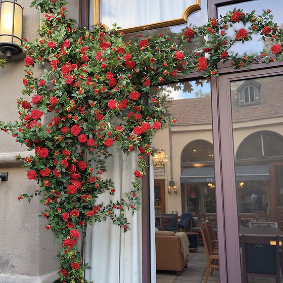 Simulated waterfall flower wall background wall rose vine women's clothing store front fake flower decoration internet celebrity photo check-in wall