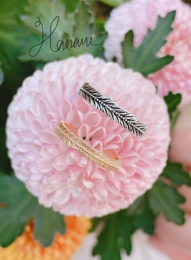 agete新年飞跃羽毛情侣开口戒指