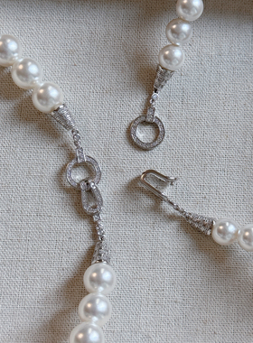 马蹄扣珍珠项链女2025新款爆款轻奢小众高级感颈链毛衣链带钻马年