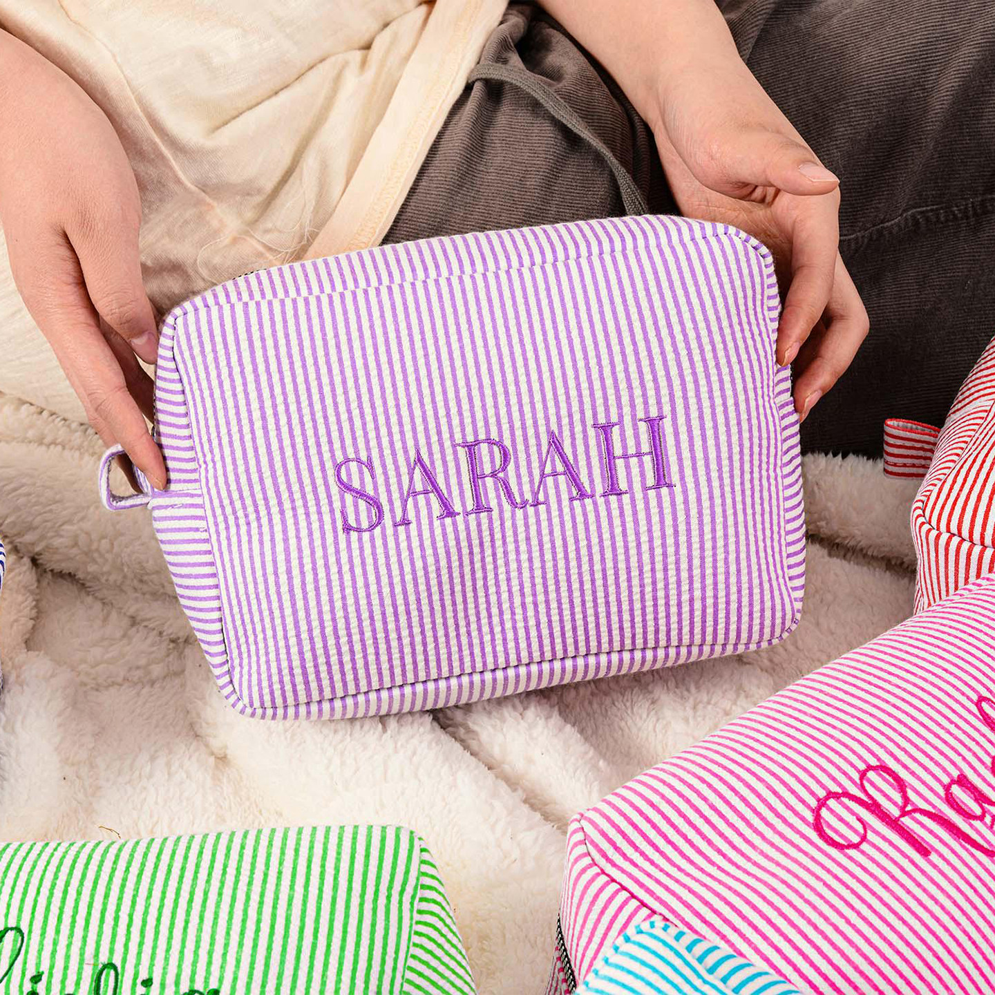 Custom embroidered seersucker striped cosmetic bag