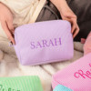 Custom embroidered seersucker striped cosmetic bag