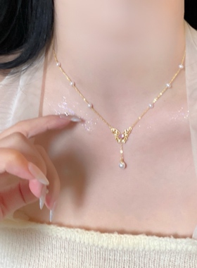 蝴蝶轻奢珍珠项链女金色流苏吊坠