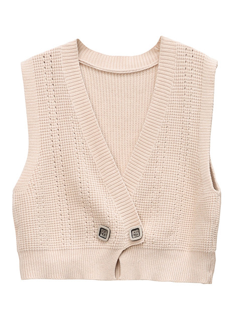 Paired with a skirt and a knitted vest jacket