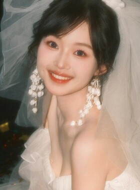 超仙白色铃兰花流苏耳环女夸张结婚纱摄影设计感耳环甜美新娘耳饰