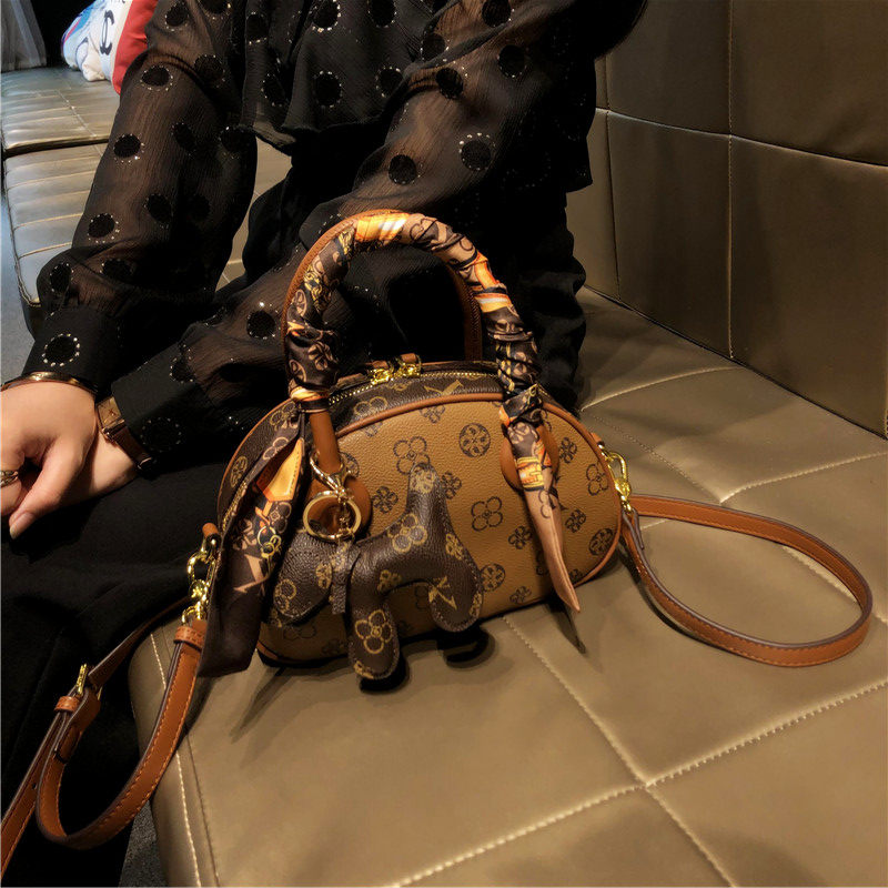 香港品牌包包女士2025新款高级时尚真皮单肩包斜挎手提贝壳包小包,淘宝优惠券,粉丝福利购,淘宝优惠卷