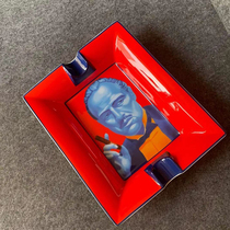 Cigar ashtray printed with artists image built by the synergy of the siglo century and contemporary artists
