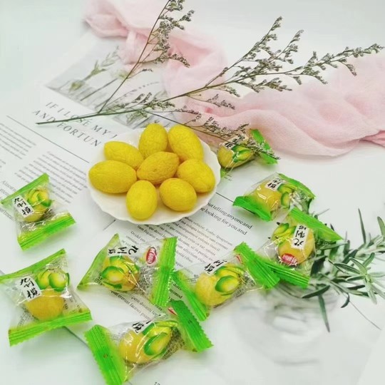 Individually packaged licorice, olive and dried olive fruit preserves