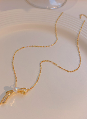 日系可爱蝴蝶结吊坠女项链2026年新款潮简约时尚仿珍珠锁骨链颈链