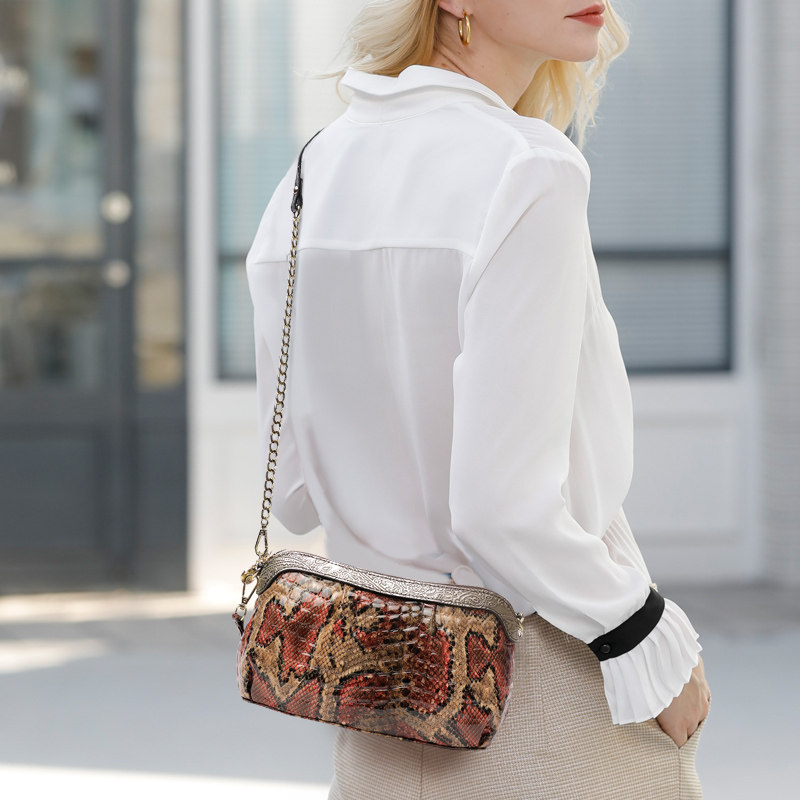 真皮手拿包女大2021新款斜挎小包包 草木生箱包女士包袋