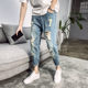 Summer piercing nine -point jeans boys Korean version of wild foot beggar pants tide card casual loose Haron pants