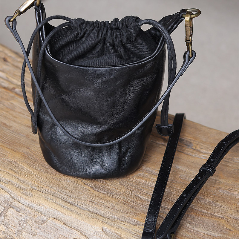 慢慢变蓝原创头层牛皮水桶包文艺复古单肩包斜挎水桶菜篮子带抽绳,淘宝优惠券,粉丝福利购,淘宝优惠卷